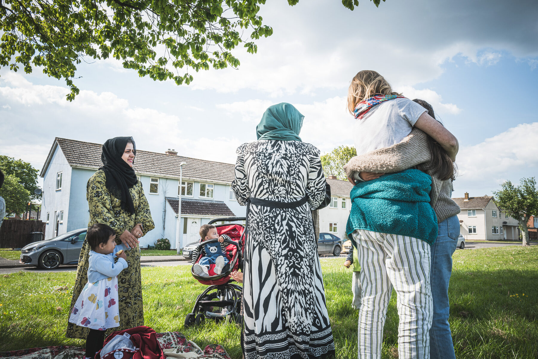 Neighbours and newcomers gathered together at a community event
