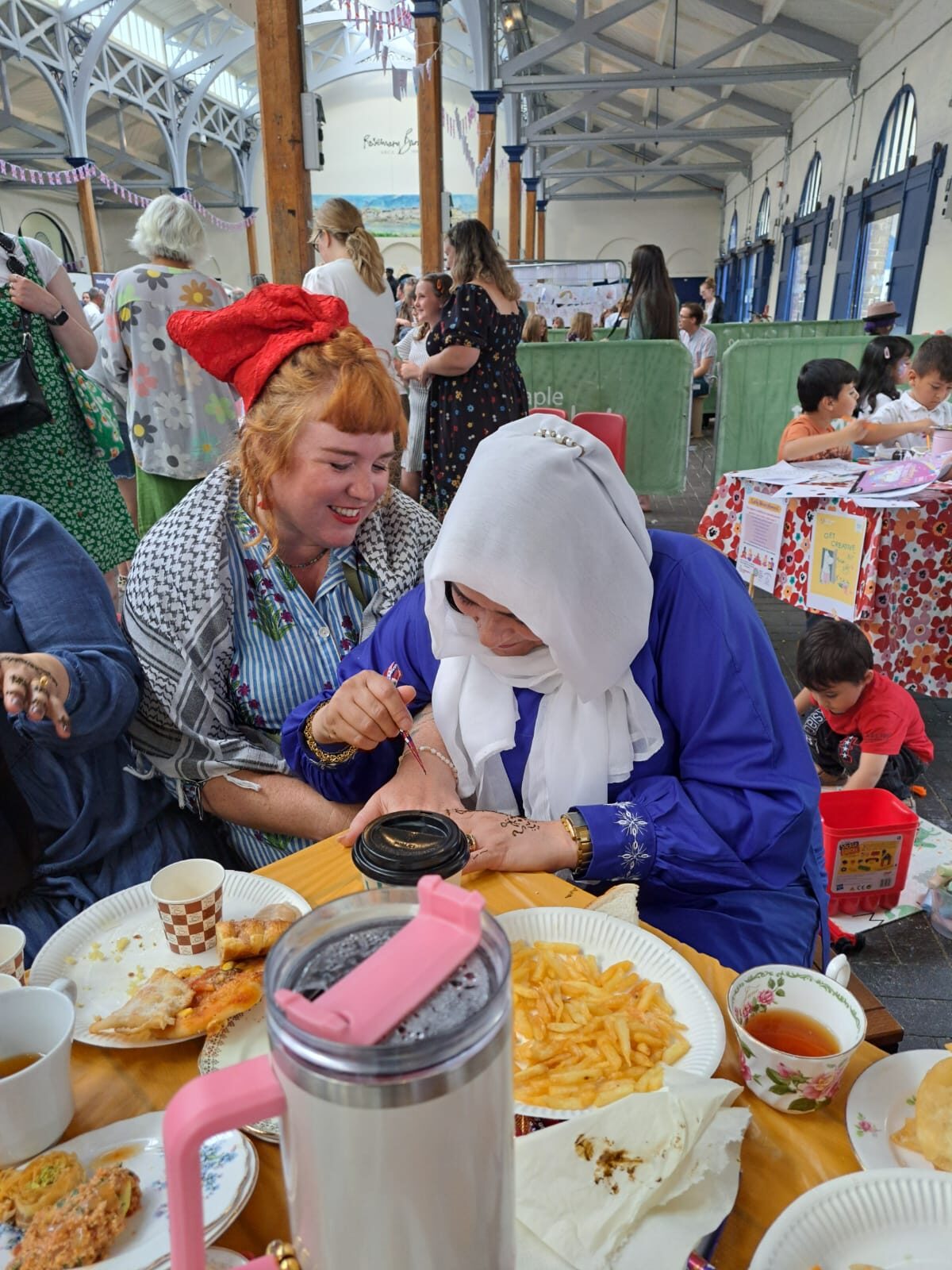 Two people sharing a moment together at a community event